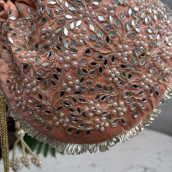 The Pearl Mirror potlis - around
