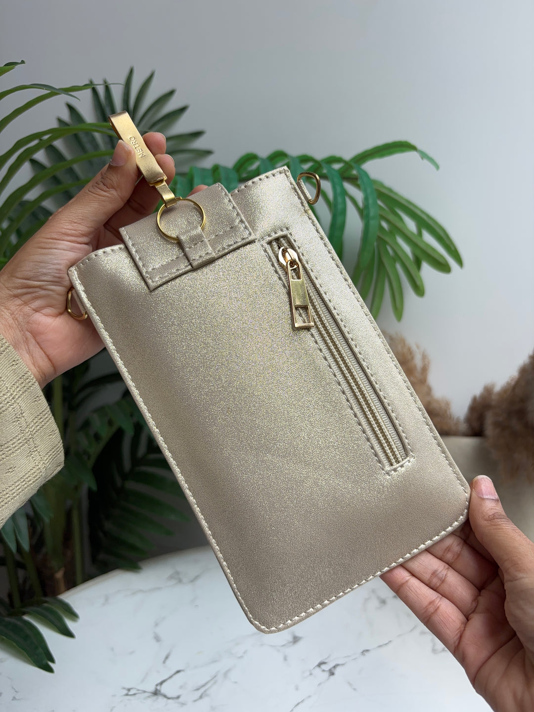 TASSELLED MOBILE SLEEVE