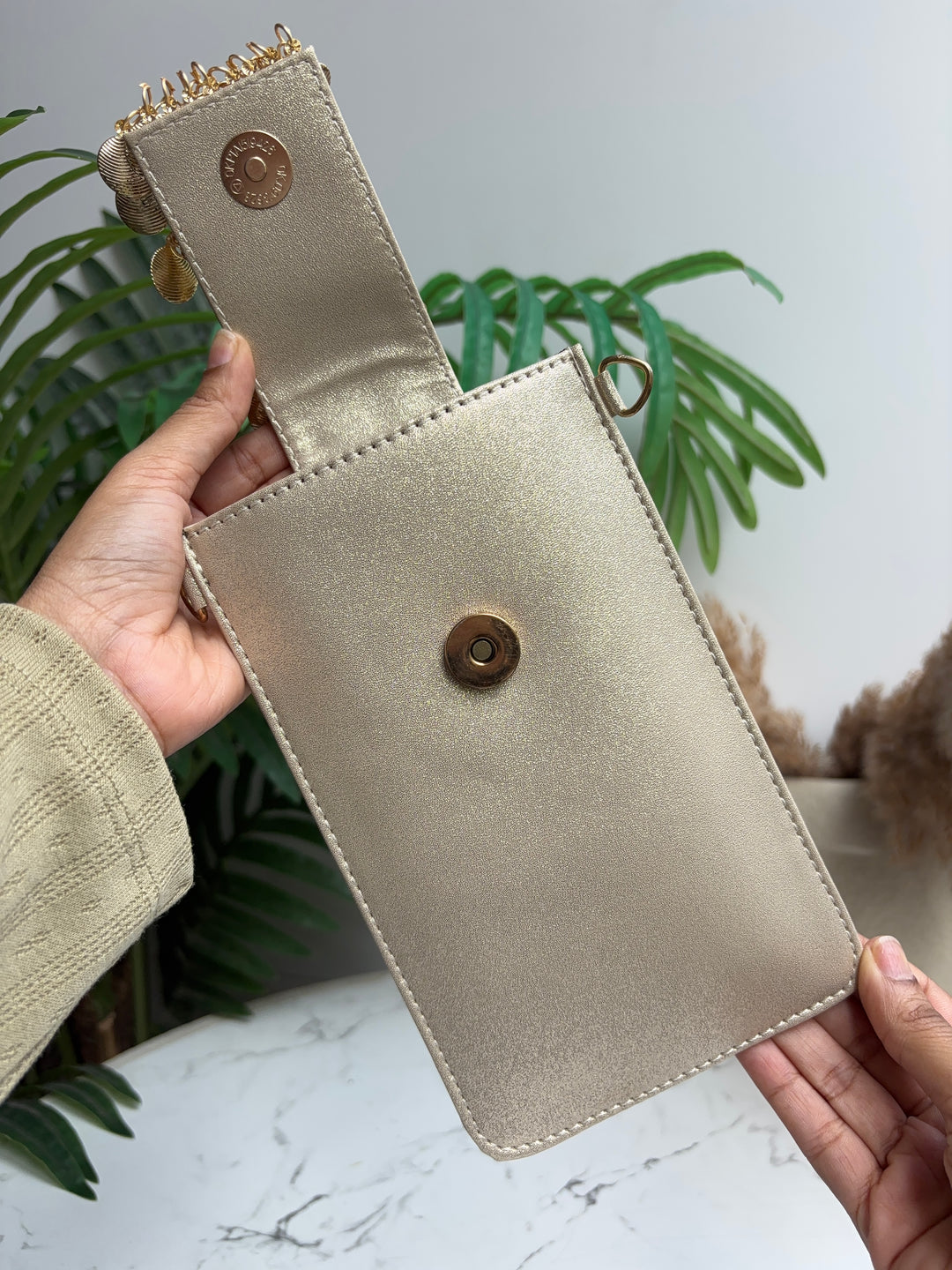 TASSELLED MOBILE SLEEVE