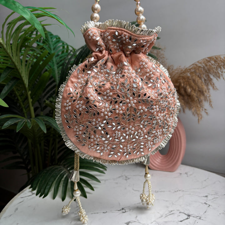 The Pearl Mirror potlis - around
