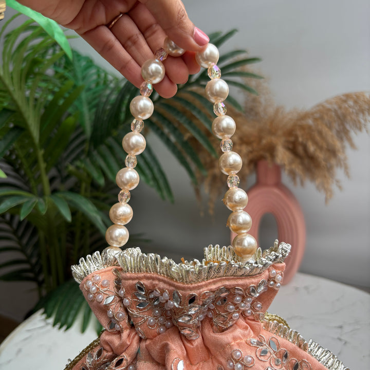 The Pearl Mirror potlis - around