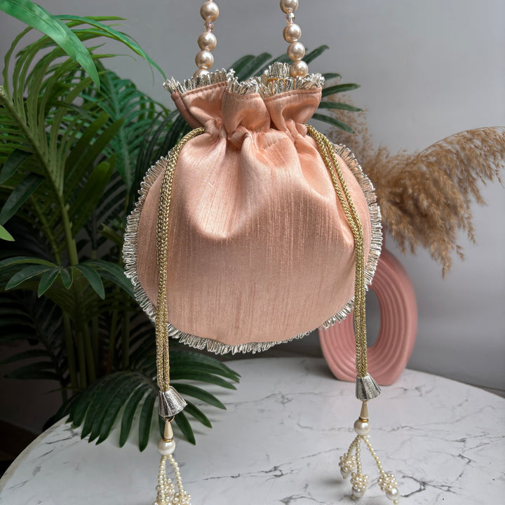 The Pearl Mirror potlis - around