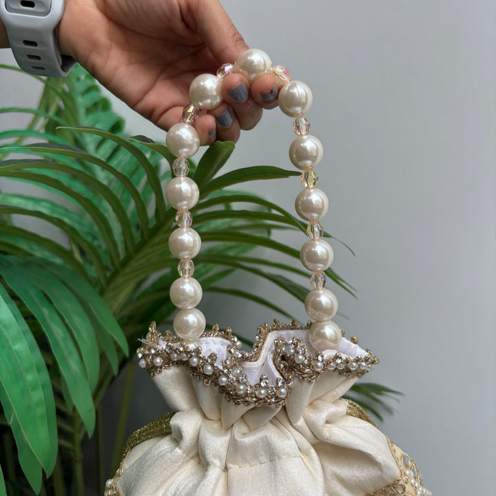 The Pearl Mirror Lace potlis