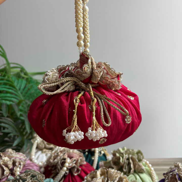 Sequin flower potlis