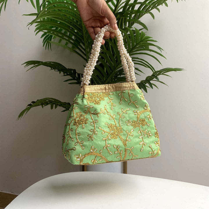 Tiny golden tree handbag