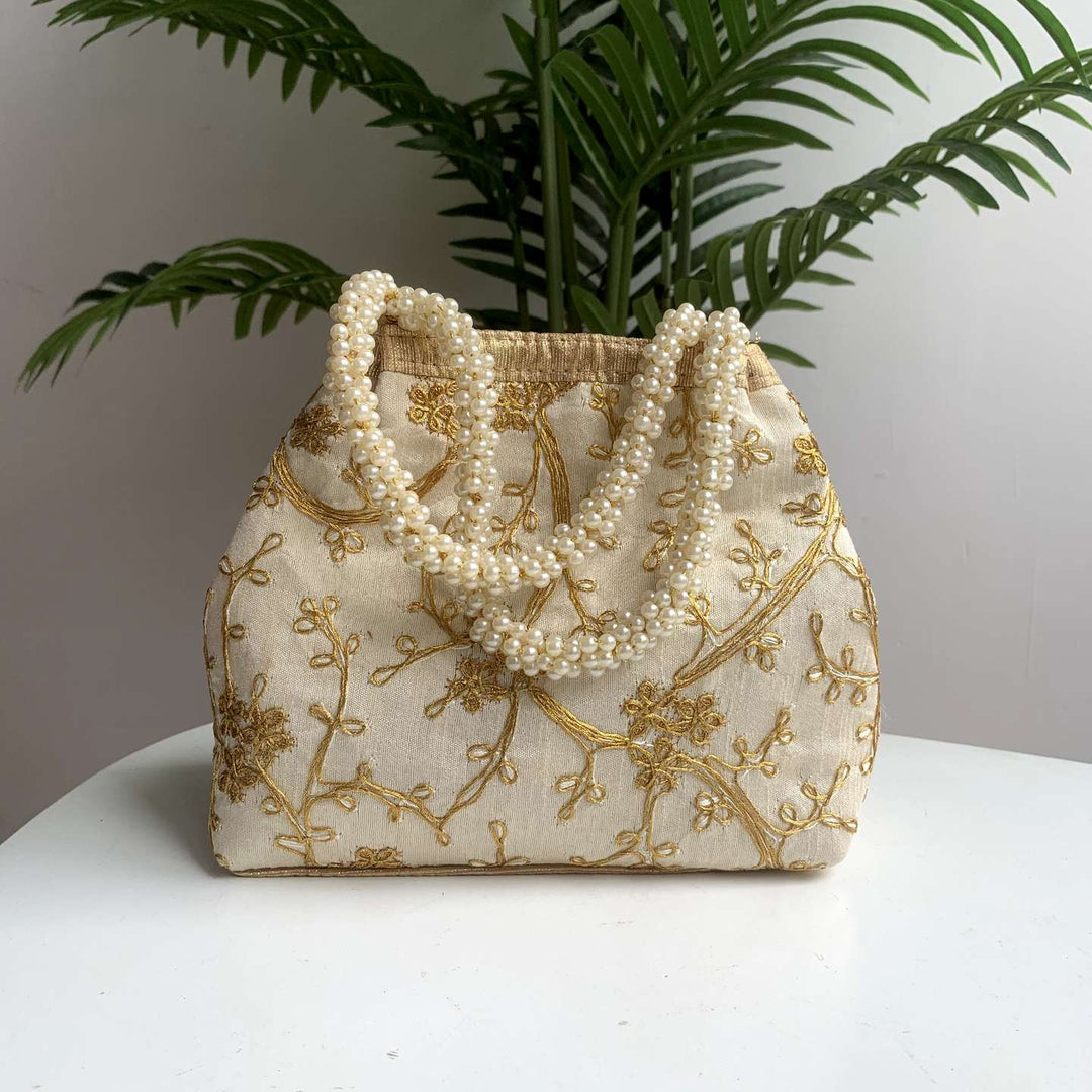 Tiny golden tree handbag